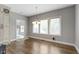 Bright breakfast nook with hardwood floors, natural light, and built-in cabinets at 1051 Arrowwood Dr, Carmel, IN 46033