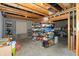 Unfinished basement featuring exposed ductwork, plywood, and shelves at 1120 Mill Run Overlook, Noblesville, IN 46062