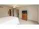 Bedroom with ceiling fan, television and built in storage at 1120 Mill Run Overlook, Noblesville, IN 46062