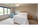 Comfortable bedroom with natural light, plush carpeting, and tasteful furnishings at 1120 Mill Run Overlook, Noblesville, IN 46062