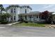 Charming two-story home with stone accents and a welcoming front porch at 115 W State Road 38, Pendleton, IN 46064