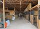 Horse stall area offering multiple partitioned areas with wood and metal construction at 115 W State Road 38, Pendleton, IN 46064