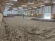 Large indoor riding arena featuring sand floor, wood beams, and ample lighting at 115 W State Road 38, Pendleton, IN 46064