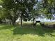 Scenic pasture with lush green grass, trees, and a black wood fence at 115 W State Road 38, Pendleton, IN 46064