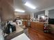 A cozy kitchen equipped with wood cabinets, modern appliances, and ample counter space at 12509 Teacup Way, Indianapolis, IN 46235