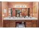 Spacious bathroom with dual sinks, vanity area, and ample storage cabinets at 13153 Tudor Dr, Carmel, IN 46033