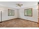Bedroom featuring carpet, baseboard trim, ceiling fan, and natural light at 13153 Tudor Dr, Carmel, IN 46033