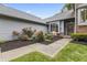 Inviting home entrance with a walkway leading to a beautiful flower garden at 13153 Tudor Dr, Carmel, IN 46033