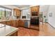 Well-equipped kitchen with stainless appliances and natural light at 13153 Tudor Dr, Carmel, IN 46033