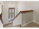 Staircase features neutral carpet, window nook, overhead light fixture at 13153 Tudor Dr, Carmel, IN 46033