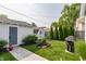 Landscaped backyard boasting well-manicured lawn, and a shed for extra storage at 1437 Shannon Ave, Indianapolis, IN 46201