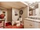 Quaint bathroom featuring vintage accents, stand-up shower, and granite countertops at 1437 Shannon Ave, Indianapolis, IN 46201