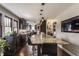 Open kitchen featuring a large island with granite countertop, seating, and pendant lighting at 1437 Shannon Ave, Indianapolis, IN 46201