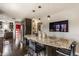 Bright kitchen with a large island featuring a granite countertop and seating for entertaining at 1437 Shannon Ave, Indianapolis, IN 46201