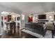 Comfortable living room showcasing hardwood floors and an open kitchen at 1437 Shannon Ave, Indianapolis, IN 46201