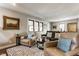 Spacious living room with armchairs, plush seating and natural light at 1437 Shannon Ave, Indianapolis, IN 46201