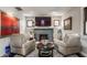 Beautiful living room with a decorative fireplace and accent lighting at 1437 Shannon Ave, Indianapolis, IN 46201