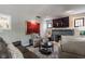 Bright living room featuring comfortable seating and a decorative fireplace at 1437 Shannon Ave, Indianapolis, IN 46201