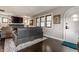 Cozy living room with hardwood floors and a view to the front door at 1437 Shannon Ave, Indianapolis, IN 46201