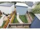 Aerial view of backyard featuring fire pit, patio furniture, and new fence at 1452 Fletcher Ave, Indianapolis, IN 46203