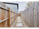 Backyard area with gravel and stepping stones leading to the gate at 1452 Fletcher Ave, Indianapolis, IN 46203