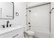 Stylish bathroom features a shower, bathtub, modern fixtures, and vanity sink at 1452 Fletcher Ave, Indianapolis, IN 46203