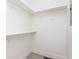 Spacious walk-in closet offers ample storage with built-in shelving and lighting at 1452 Fletcher Ave, Indianapolis, IN 46203