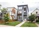 Charming modern homes with stylish exteriors, manicured lawns, and complementing architectural designs at 1452 Fletcher Ave, Indianapolis, IN 46203