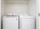 Laundry room features side by side washer and dryer at 1452 Fletcher Ave, Indianapolis, IN 46203