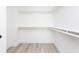 Spacious walk-in closet with ample shelving, providing great storage solutions at 1452 Fletcher Ave, Indianapolis, IN 46203