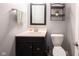 Bathroom features a modern vanity with a dark cabinet and brushed nickel hardware at 1477 Macintosh Ct, Avon, IN 46123