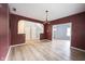 Open floor plan from living room showcases the staircase and other living areas at 1477 Macintosh Ct, Avon, IN 46123