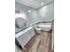 Stylish bathroom featuring a modern vanity, soaking tub, and elegant fixtures at 15873 Hush Hickory Bnd, Westfield, IN 46074