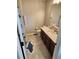 Bathroom with white cabinets, a shower with a curtain, and a shark themed rug at 15873 Hush Hickory Bnd, Westfield, IN 46074