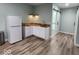 Well-equipped kitchenette with modern appliances, ample counter space, and sleek cabinetry at 15873 Hush Hickory Bnd, Westfield, IN 46074