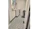 Bright laundry room featuring a washer, dryer, patterned tile flooring, and plenty of storage space at 15873 Hush Hickory Bnd, Westfield, IN 46074