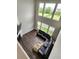 Living room with a high ceiling, many large windows and a fireplace at 15873 Hush Hickory Bnd, Westfield, IN 46074