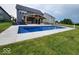 Amazing pool and covered outdoor kitchen with ample seating and well maintained yard at 15873 Hush Hickory Bnd, Westfield, IN 46074