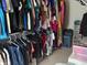 Walk-in closet with organization system and storage for clothing and accessories at 1711 Jaques Dr, Lebanon, IN 46052