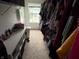 Walk-in closet with organization system and storage for clothing and accessories at 1711 Jaques Dr, Lebanon, IN 46052