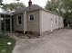 Tan house with a screened-in porch at 1741 N Riley Ave, Indianapolis, IN 46218