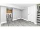 Spacious basement featuring a doorway and the bottom of a stairway at 1820 Hemlock Ln, Plainfield, IN 46168