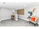 Finished basement features a bar, seating area, light gray paint and wood accent wall at 1820 Hemlock Ln, Plainfield, IN 46168