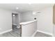 Finished basement features a bar, light gray paint, and wood accent wall at 1820 Hemlock Ln, Plainfield, IN 46168