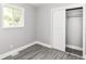 Bedroom with window and closet with sliding doors at 1820 Hemlock Ln, Plainfield, IN 46168
