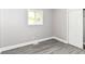 Bedroom with a window and a closet with sliding doors at 1820 Hemlock Ln, Plainfield, IN 46168