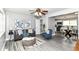 Cozy living room with stylish decor, neutral tones, comfortable seating, and an adjacent eat-in kitchen at 1820 Hemlock Ln, Plainfield, IN 46168