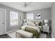 Bedroom with neutral walls, comfortable bed, and abundant natural light at 1915 Albany St, Beech Grove, IN 46107