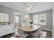 Bright dining room with modern furniture and ample natural light at 1915 Albany St, Beech Grove, IN 46107