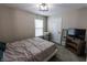 Comfortable bedroom featuring a bed, natural light, and a relaxing atmosphere at 1981 Turning Leaf Dr, Franklin, IN 46131